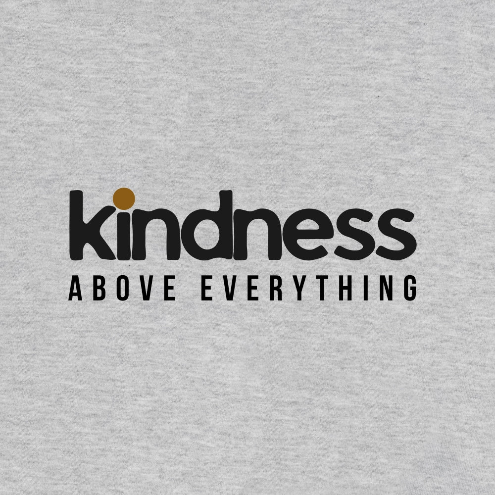 Gray sweatshirt with 'kindness above everything' text on a plain background beige organic kindness tee #color_heather grey